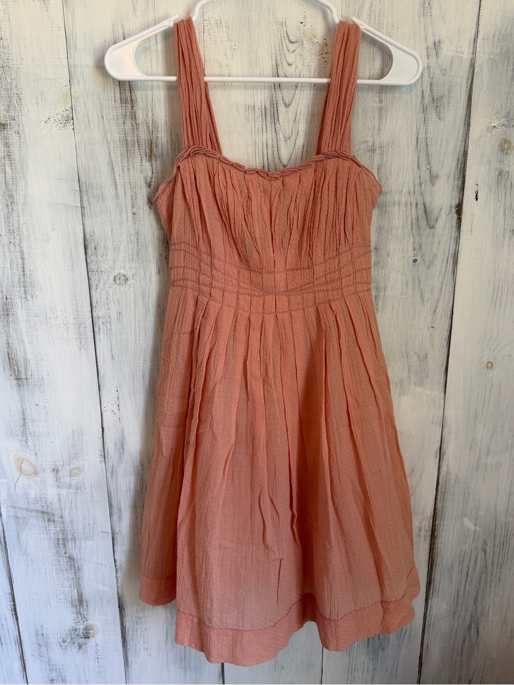 Sleeveless Midi Dress in Dusty Coral with Ruched Bodice